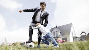 person playing soccer with a kid