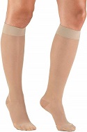 person wearing white knee-high socks