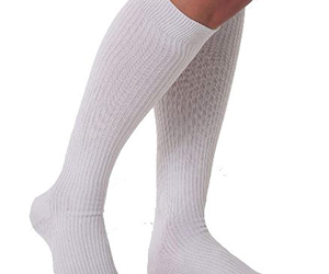 20-30 mmHg compression socks will help most for the swollen ankle