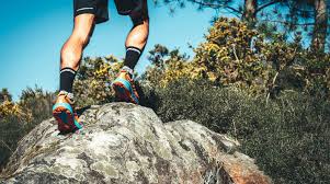 climber wearing socks while climbing a mountain
