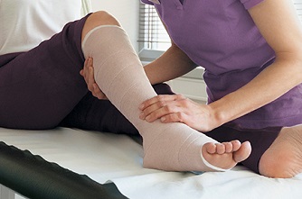 picture of patient being treated through compression therapy