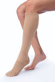 A patient with a severe case of edema wearing 30-40mmHg compression socks.