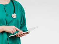 picture of medical staff in green uniform with stethoscope and using tablet in hand while wearing graduated knee high clothing to help improve blood circulation