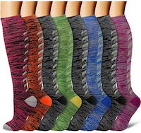 Various colored compression socks for athletes to wear.