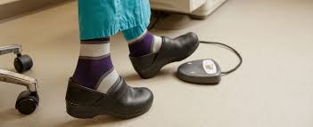 A nurse wearing black compression socks