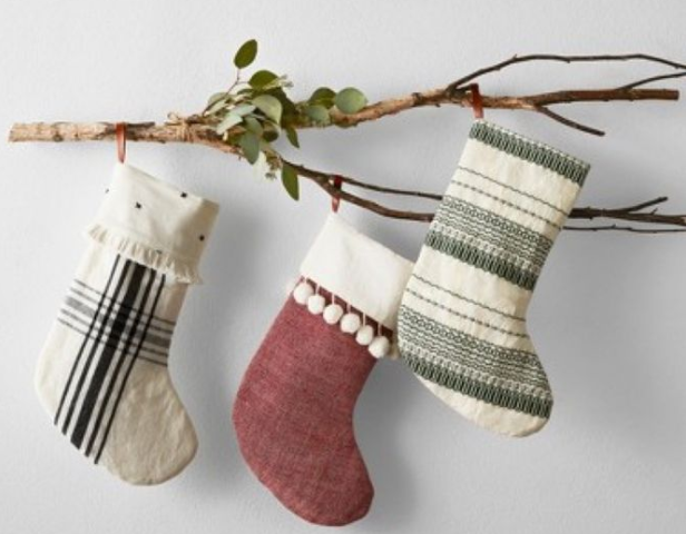 socks hanging on a tree branch