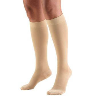 a man wearing compression socks to prevent swelling and edema