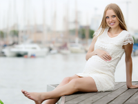 Expectant mother wearing compression stockings