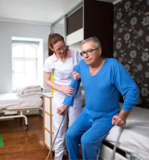 Nurse helps an immobile patient