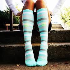 A nurse wearing colorful compression socks