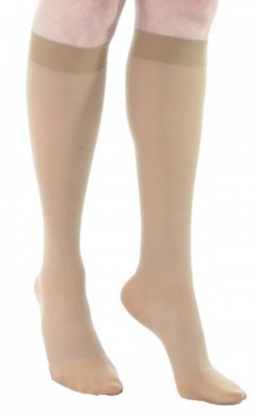 Compression knee high stockings with silicone border