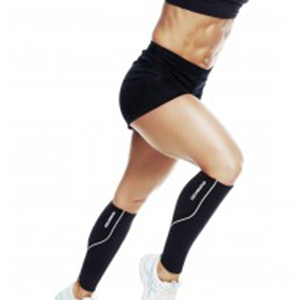 a female athlete wearing support socks help boost blood flow to heal injury to the calf and knee