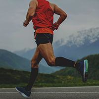 athlete wearing compression running socks