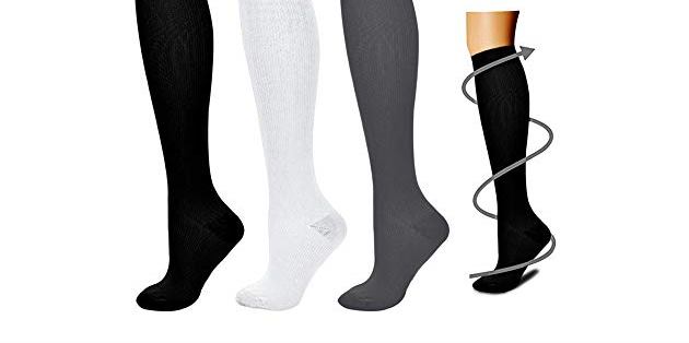 a photo of four different compression socks for use in more formal attire