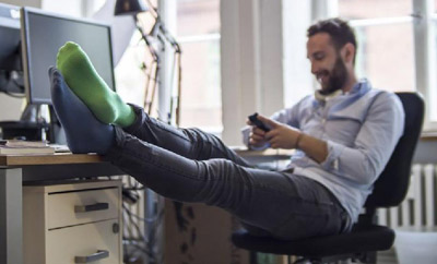 Man wearing compression socks for men while sitting