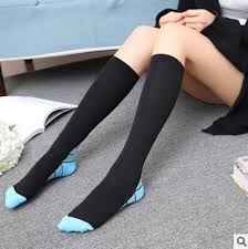 woman wearing compression stockings