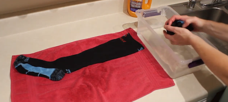 image of socks laid flat to dry in a towel