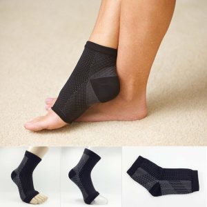 Wearing ankle compression socks for better ankle support and enhance injury recovery to also reduce ankle pain