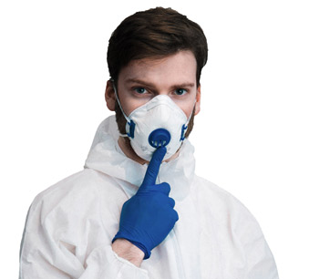 Man in respirator mask and coveralls.