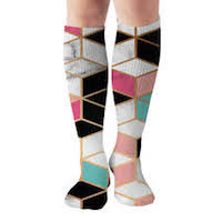 Geometric designed compression socks in pinks, teals, and black colored design.