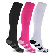 A black, pink and white knee-high nursing support socks for nurses.
.

