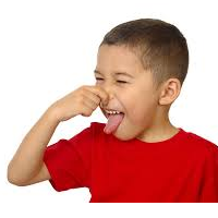 Boy holding his nose and sticking out his tongue because of a foul odor presumably from compression gear