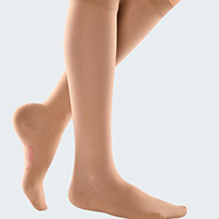 woman wearing opaque compression socks