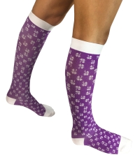 person wearing purple and white compression socks