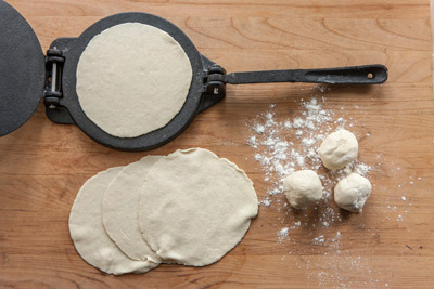 Dough on Tortilla Press