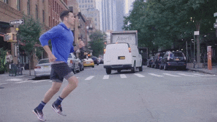 man jogging on streets
