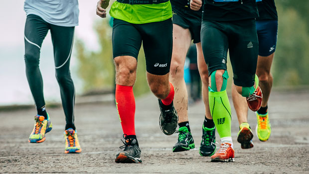 Image showing men running with compression stockings