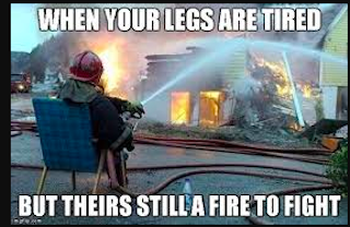 tired fireman sitting while putting a fire out should try compression sleeves for leg endurance