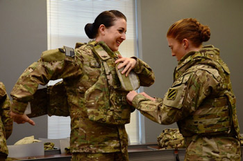 Female soldiers gearing up